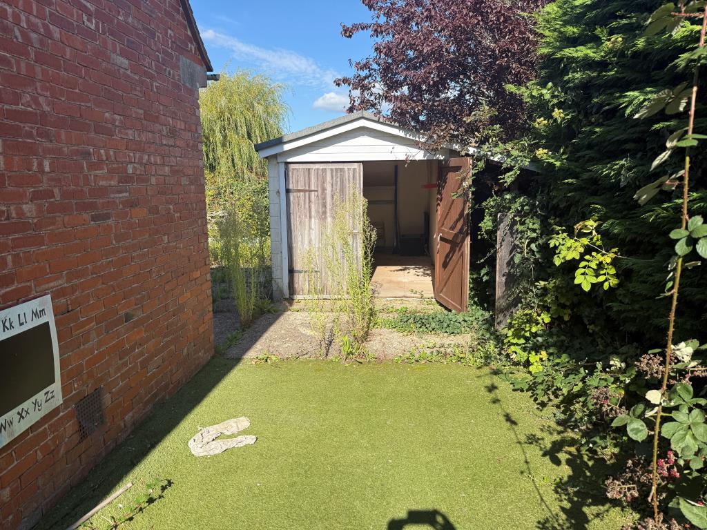 Lot: 29 - FORMER METHODIST CHURCH WITH RESIDENTIAL CONSENT - Rear store and patio